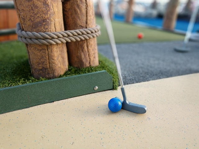 Golf club and ball at a mini golf course in Madison, AL