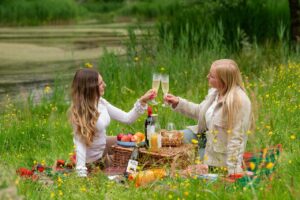 enjoying a picnic while Home Clean Heroes cleans their house