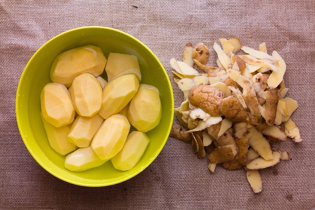 Peeled potatoes in a bowl