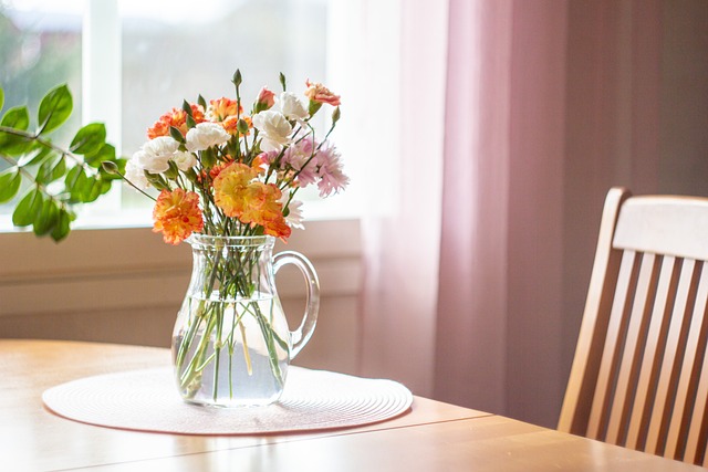 Vase of flowers on kitchen table